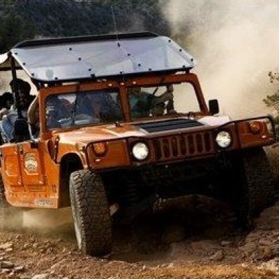 hummer driving on an off road trail